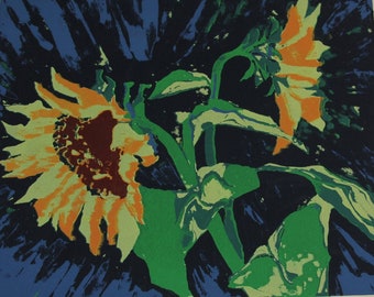 May include: A colorful print of two sunflowers with green stems and leaves against a dark blue background. The print is titled "Sunflowers" and signed "Pringle" with the number "7/7" in the bottom right corner.