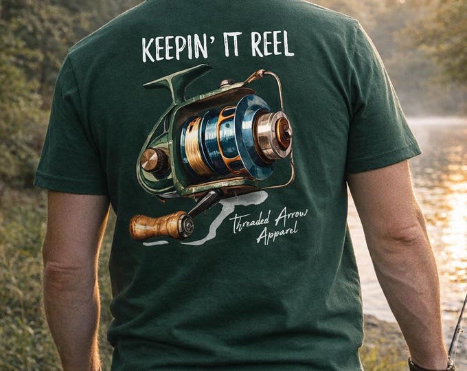 Featured listing image: Keepin’ It Reel Fishing T-Shirt | Comfort Colors Tee | Outdoor Graphic Shirt | Threaded Arrow Apparel Original