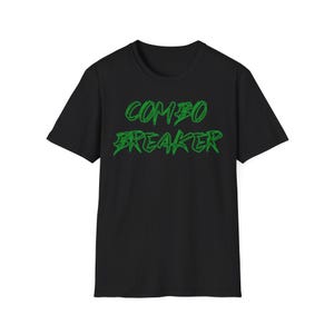 May include: Black t-shirt with a green graphic that says "COMBO BREAKER" in a stylized font.
