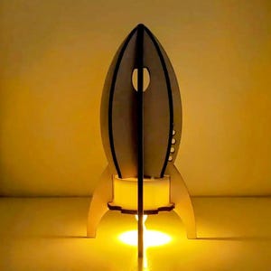 Archivo cortado con láser de rompecabezas de nave espacial 3D con motor de vela de té SVG y DXF