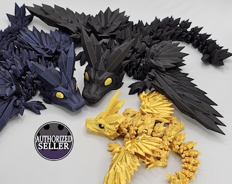 May include: Three 3D printed dragon figurines. One is black, one is dark blue, and one is gold. They are all made of a spiky, crystalline material.