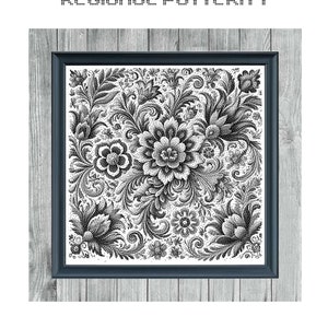 Op de afbeelding: Een zwart-wit kruissteekpatroon met een bloemmotief met ingewikkelde details. Het patroon is ingelijst in een houten lijst met een grijze achtergrond. De tekst "REGIONAL PATTERN 1" staat bovenaan de afbeelding en "MONOCHROME CROSS STITCH PATTERN" staat onderaan.