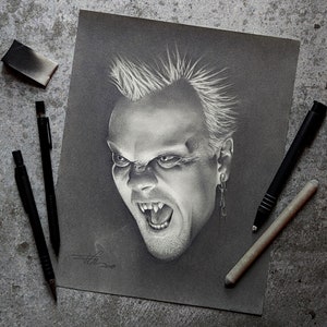 May include: A black and white pencil drawing of a man with a mohawk hairstyle. The man has a fierce expression with his mouth open and fangs showing. The drawing is on a grey background.