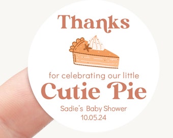 May include: Round sticker with a brown and white pie illustration and the text "Thanks for celebrating our little Cutie Pie Sadie's Baby Shower 10.05.24".
