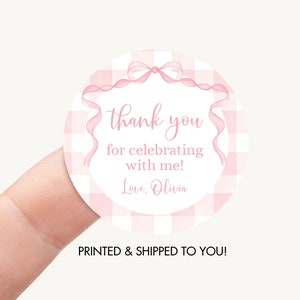 May include: Pink and white gingham circle sticker with a pink ribbon bow and the text "thank you for celebrating with me! Love, Olivia".