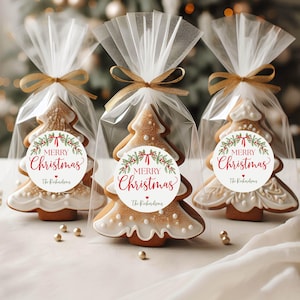 May include: Three Christmas tree-shaped cookies in clear cellophane bags tied with gold ribbons. Each bag features a round white sticker with a green holly wreath, red berries, and the text Merry Christmas and The Richardsons.