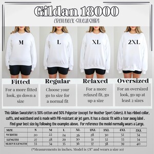 May include: White Gildan 18000 crewneck sweatshirt, shown in four sizes: M, L, XL, and 2XL. The image includes a size chart with measurements in inches, and details about the sweatshirt's fabric and features.