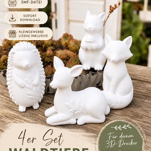 Puede incluir: Un conjunto de cuatro figuras de animales del bosque impresas en 3D en color blanco, que incluyen un erizo, una ardilla con una bellota, un zorro y un cervatillo. La imagen incluye etiquetas de texto para archivos STL, 3MF y licencia comercial.