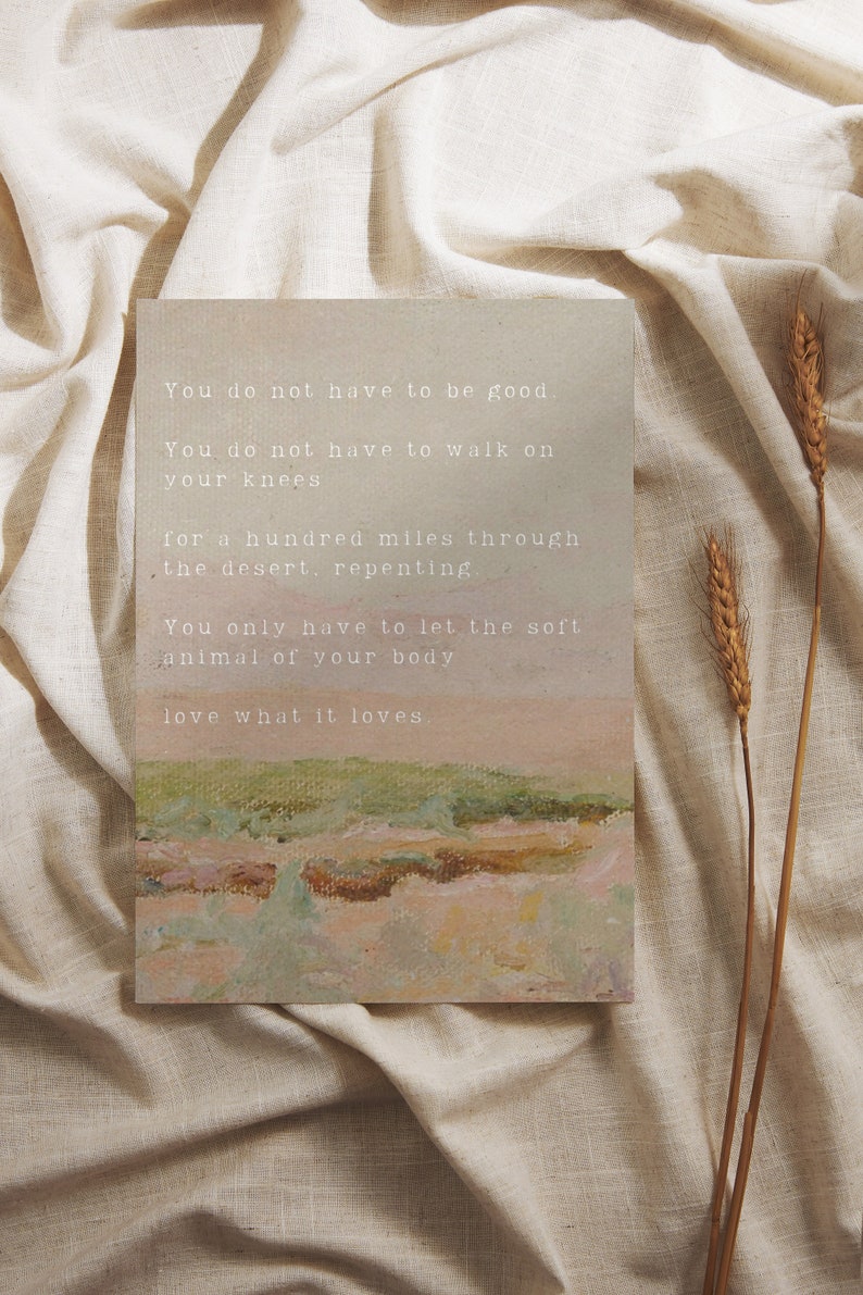 May include: A beige linen background with a quote printed on a card. The quote reads: "You do not have to be good. You do not have to walk on your knees for a hundred miles through the desert, repenting. You only have to let the soft animal of your body love what it loves."