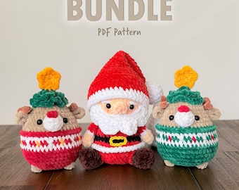 May include: A collection of three crocheted Christmas ornaments. The ornaments include a Santa Claus figure and two reindeer figures. The Santa Claus figure is wearing a red hat and suit. The reindeer figures have a green hat with a yellow star on top. The word "BUNDLE" is at the top.