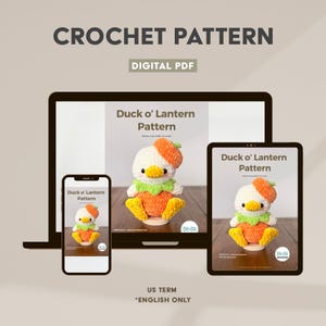 May include: A digital PDF crochet pattern titled Duck o' Lantern Pattern displayed on a laptop, tablet, and smartphone screen. The pattern features a white crocheted duck with an orange pumpkin hat, a green collar, and orange feet.