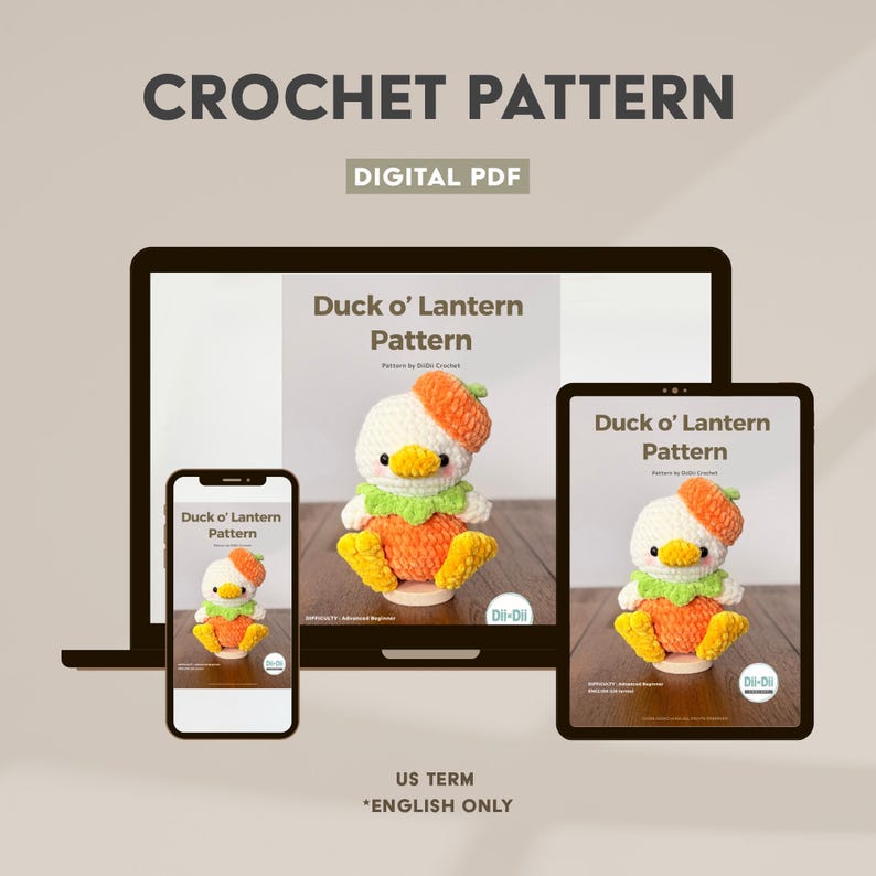 May include: A digital PDF crochet pattern titled Duck o' Lantern Pattern displayed on a laptop, tablet, and smartphone screen. The pattern features a white crocheted duck with an orange pumpkin hat, a green collar, and orange feet.