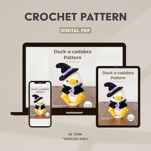 May include: A digital PDF crochet pattern titled Duck-a-cadabra Pattern displayed on a laptop, tablet, and smartphone. The pattern features a white crocheted duck wearing a black witch hat with a purple band and a black cape with a purple bow.