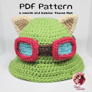 Könnte beinhalten: Grüner Häkelhut mit braunen und roten Schutzbrillen und beigefarbenen Ohren. Der Hut ist für ein 6 Monate altes Baby konzipiert. Der Text "PDF Pattern 6 month old babies: Teemo Hat" befindet sich oben im Bild. Der Text "By: Rumi Crochets" befindet sich unten im Bild.