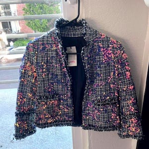 Blå, lila sekvenskavaj från River Island, finns i storlek small