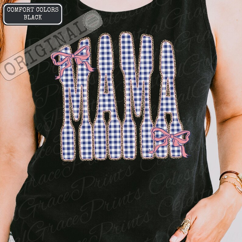 May include: Black vest top featuring the word "MAMA" in a blue and white gingham pattern, edged with a leopard print design. Pink bows are placed above and below the word. The top is labelled "Comfort Colors Black."
