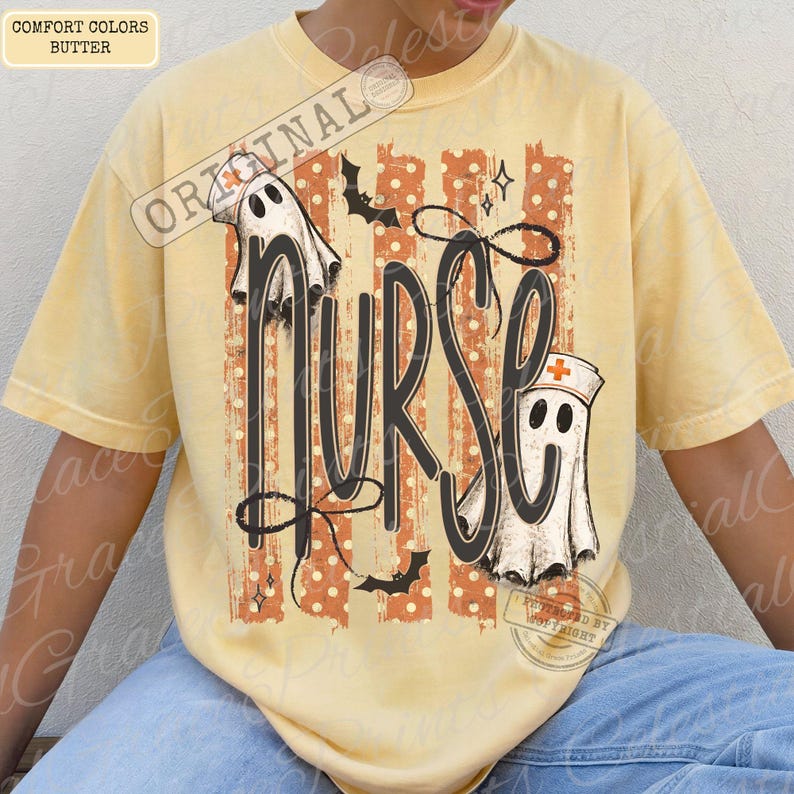 May include: A butter yellow t-shirt featuring a graphic with the word NURSE in large black script. The design includes two white ghosts, one wearing a nurse cap with a red cross, orange vertical stripes with white polka dots, and black bats.