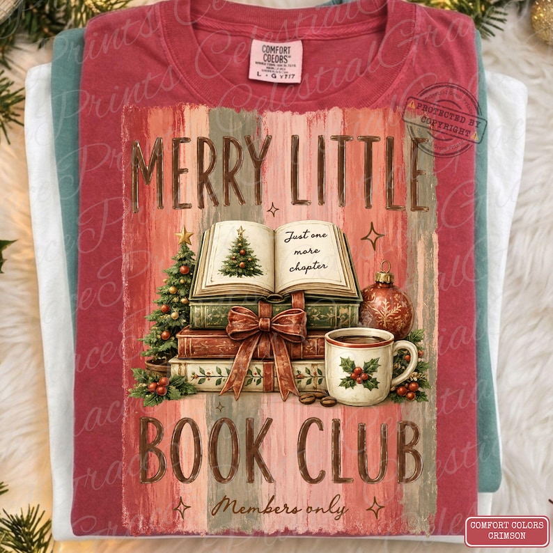 May include: A crimson t-shirt featuring a graphic of a stack of books, a small Christmas tree, a red ornament, and a mug with holly berries. The text reads MERRY LITTLE BOOK CLUB and Just one more chapter. The shirt has a Comfort Colors label.