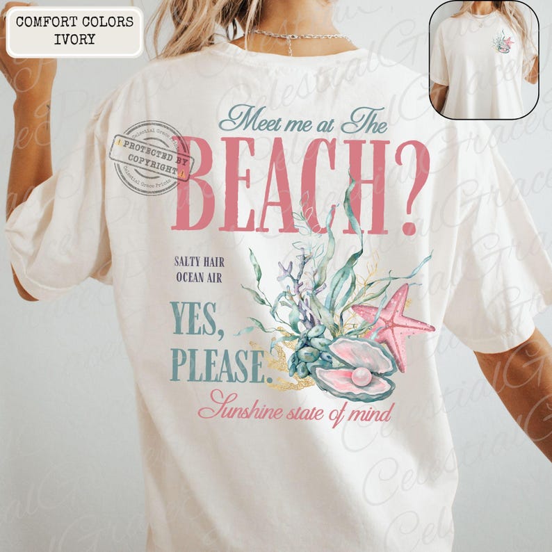 May include: Ivory t-shirt with the text "Meet me at The BEACH?" in pink and teal. The shirt features a seashell, starfish, and coral graphic. The words "Salty Hair, Ocean Air, Yes, Please, Sunshine state of mind" are also printed on the shirt.