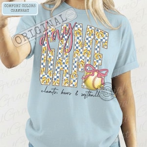 May include: Light blue t-shirt with the words "GAME DAY" in a checkered pattern with yellow bows. A softball with a pink bow is on the right. The text "cleats, bows & softball" is below the main text.