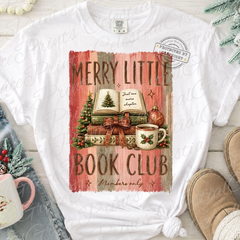 May include: A white t-shirt featuring a graphic of a stack of books, a Christmas tree, and a mug with holly berries. The text reads MERRY LITTLE BOOK CLUB and Members only. The background of the graphic has vertical red and beige stripes.