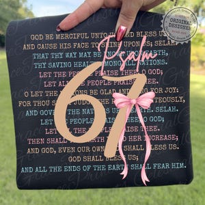 May include: Black square with the text of Psalm 67 in pink and white. A large number 67 is in the center, with a pink bow. The words "Celestial Grace Prints" are in the corners.
