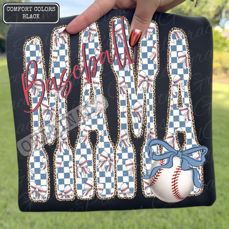 May include: Black t-shirt with the words "Baseball Mama" in a red script font. The letters are filled with a blue and white checkered pattern and baseballs. A baseball with a blue bow is on the bottom right.