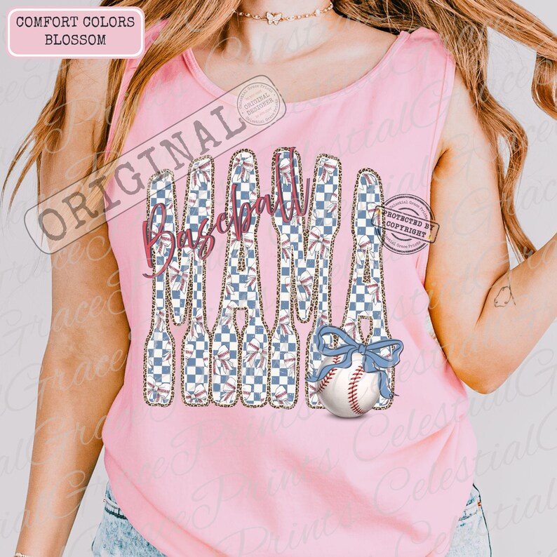 May include: Pink tank top with a baseball-themed design. The word "Baseball" is written in pink script, with baseball bats and a baseball with a blue bow. The bats have a blue and white checkered pattern.