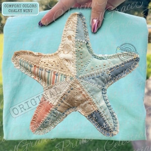 May include: A patchwork starfish in shades of blue, beige, and red, with visible stitching. The starfish is held against a light blue background. The text "COMFORT COLORS CHALKY MINT" and "ORIGINAL" are visible.