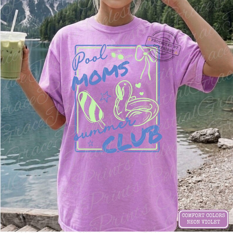 May include: A lilac-colored t-shirt with a neon green and blue graphic that reads "Pool Moms Summer Club." The design includes a popsicle, a flamingo float, and stars. The shirt is made of Comfort Colors material.