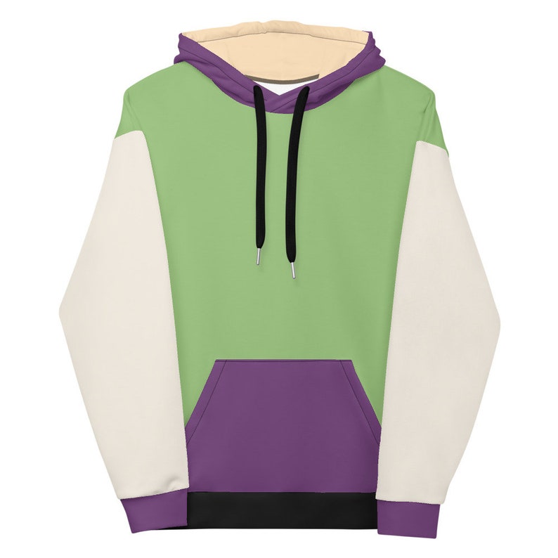 Puede incluir: Una sudadera con capucha de color verde, morado y crema con un cord&oacute;n de ajuste negro y un bolsillo canguro.