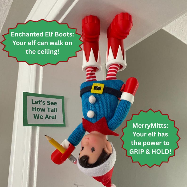 May include: A toy elf hanging upside down from a ceiling, wearing red boots, striped leggings, a blue sweater with white buttons, and a red hat. The elf holds a yellow pencil. Text reads: Enchanted Elf Boots: Your elf can walk on the ceiling!, Let's See How Tall We Are!, MerryMitts: Your elf has the power to GRIP & HOLD!
