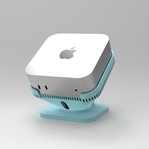 Può includere: Un computer Apple bianco con un supporto blu. Il computer ha un logo Apple argentato sul davanti.