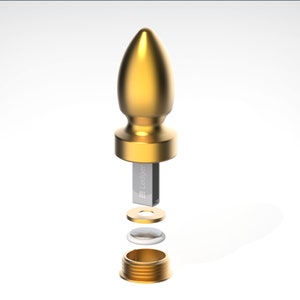 Könnte beinhalten: Ein goldfarbener Metallknauf mit einem silbernen Ledger Nano S USB-Stick, zwei silbernen Ringen und einer goldfarbenen Metallbasis.