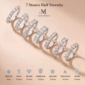 May include: Seven silver-toned half eternity rings featuring seven stones each in various cuts: round, oval, heart, emerald, square, triangle, and pear. The text reads 7 Stones Half Eternity, Amelia Minimalist, and lists stone shapes with 4mm, 3mm sizes.