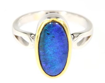 Owalny australijski opal głazowy z niebieską grą kolorów w srebrze próby 925