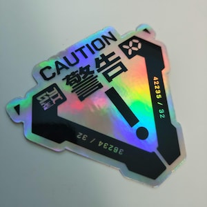 HOLOGRAPHIC CAUTION - Cyberpunk Techwear Sticker Premium Vinyl Sci-fi - Sleek Modern Design for Notepads, Bottles, Laptops, Tech,