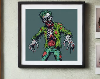May include: A pixelated illustration of a green zombie with a bloody torso and ripped clothing. The zombie has a green face with red eyes and a wide open mouth. The zombie is reaching out with both hands.