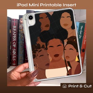 May include: Clear iPad Mini case with a printable insert featuring a graphic of six women with various hairstyles and skin tones. The text "iPad Mini Printable Insert" is at the top. The words "Print & Cut" are at the bottom.
