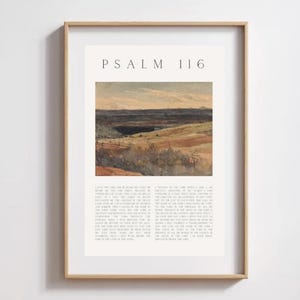 Puede incluir: Una impresión enmarcada del Salmo 116 con una pintura de acuarela de un paisaje con colinas onduladas y un cielo de puesta de sol. El texto del salmo está impreso debajo de la imagen.