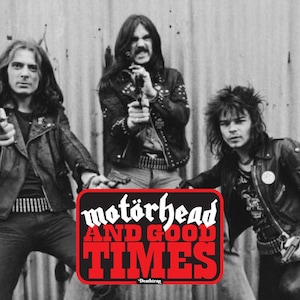 May include: Black and white photograph of a rock band, Motörhead, with the text "Motörhead And Good Times" in red and black. The band members are wearing leather jackets and jeans, and they are holding guns.