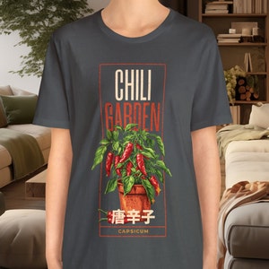 Chili garden design with orange text and a chili plant, chili fruits and japanese text japanese Typography / text, unisex t-shirt, chili tee