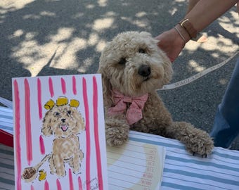 May include: A rectangular art print featuring a hand-drawn illustration of a light brown curly-haired dog wearing yellow hair rollers, with a small yellow rubber duck and a wooden brush nearby, set against a background of vertical pink stripes.