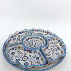 Handmade Turkish breakfast set with six blue floral ceramic bowls and a matching tray. Ottoman-inspired patterns, crafted from high-quality, food-safe ceramic. Perfect for serving breakfast, appetizers, or dips, adding elegance to any table setting.