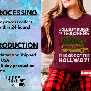 May include: A maroon crewneck sweatshirt featuring a graphic of a yellow school bus carrying a decorated Christmas tree on its roof. The text reads JOLLIEST BUNCH OF TEACHERS THIS SIDE OF THE HALLWAY in white and red lettering on the front.