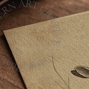 May include: A vintage-style print featuring a detailed illustration of a rabbit. The artwork is in black and white, set against a textured, tan background. The print has a rustic, antique aesthetic, with the words "NORTHERN ART CREATIVE" in a semi-circular pattern.