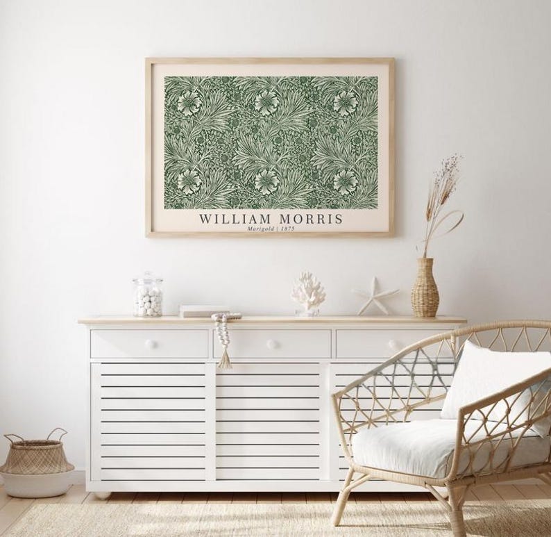 May include: A framed print of a green and white floral pattern with the text "WILLIAM MORRIS Marigold | 1875" at the bottom.