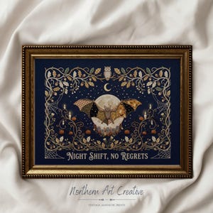 May include: A framed print on a dark blue background featuring a central bat with patterned wings in front of a full moon. The design includes an owl, oak branches, acorns, small pumpkins, candles, and spiderwebs. The text reads: NIGHT SHIFT, NO REGRETS.