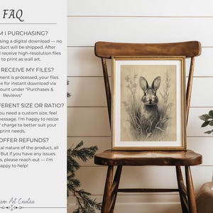 May include: A framed sepia-toned print of a rabbit in tall grass, displayed on a wooden chair. The artwork has a vintage aesthetic. The image is part of a wall art collection.