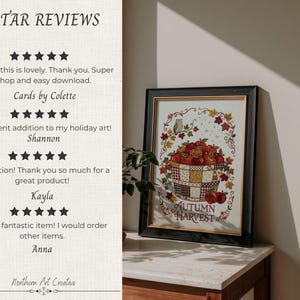 May include: A framed wall art print titled Autumn Harvest featuring a basket of red apples, a small owl, and colorful fall leaves. The artwork is displayed in a black frame with gold trim, showcasing a detailed illustration of seasonal produce.